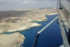LIBYA COASTLINE AERIAL VIEW by Tim Gilbert